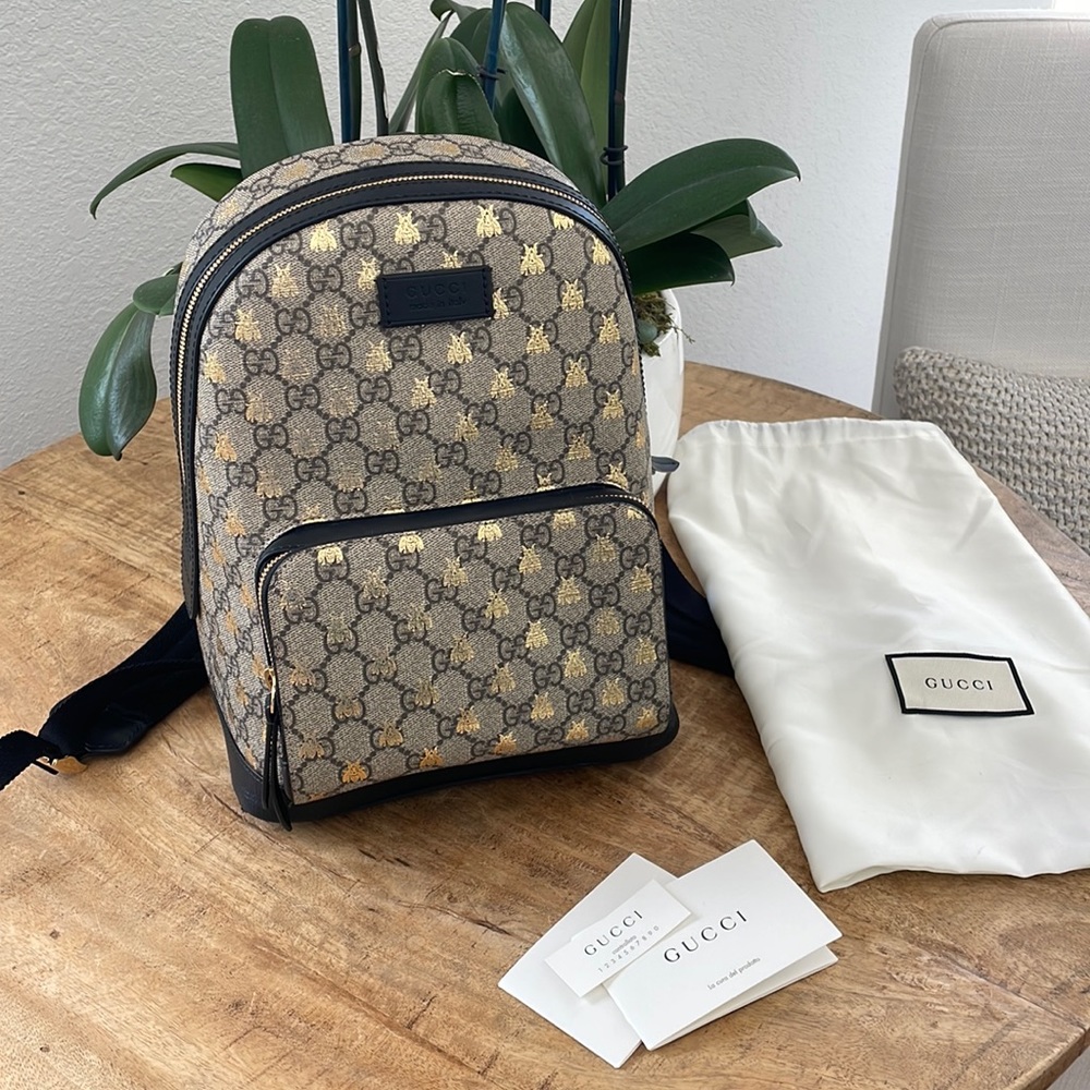 Gucci small GG supreme backpack